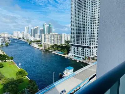 a view of a river in a city with buildings at Walk to the Waves, 2 Full Bed Beach Studio Stay in Hallandale Beach