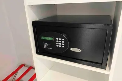 a microwave oven on a shelf in a kitchen at Luxe Beachfront Living - Premium Comfort -A in Hallandale Beach