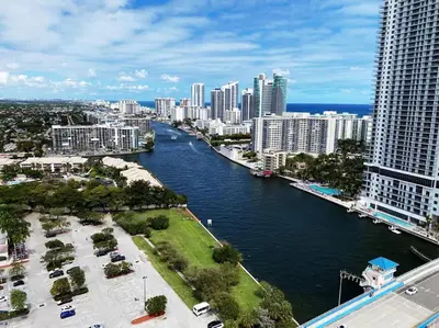 a view of a river in a city with tall buildings at Scenic Miami Beach Oasis - Full Kitchen -08A in Hallandale Beach